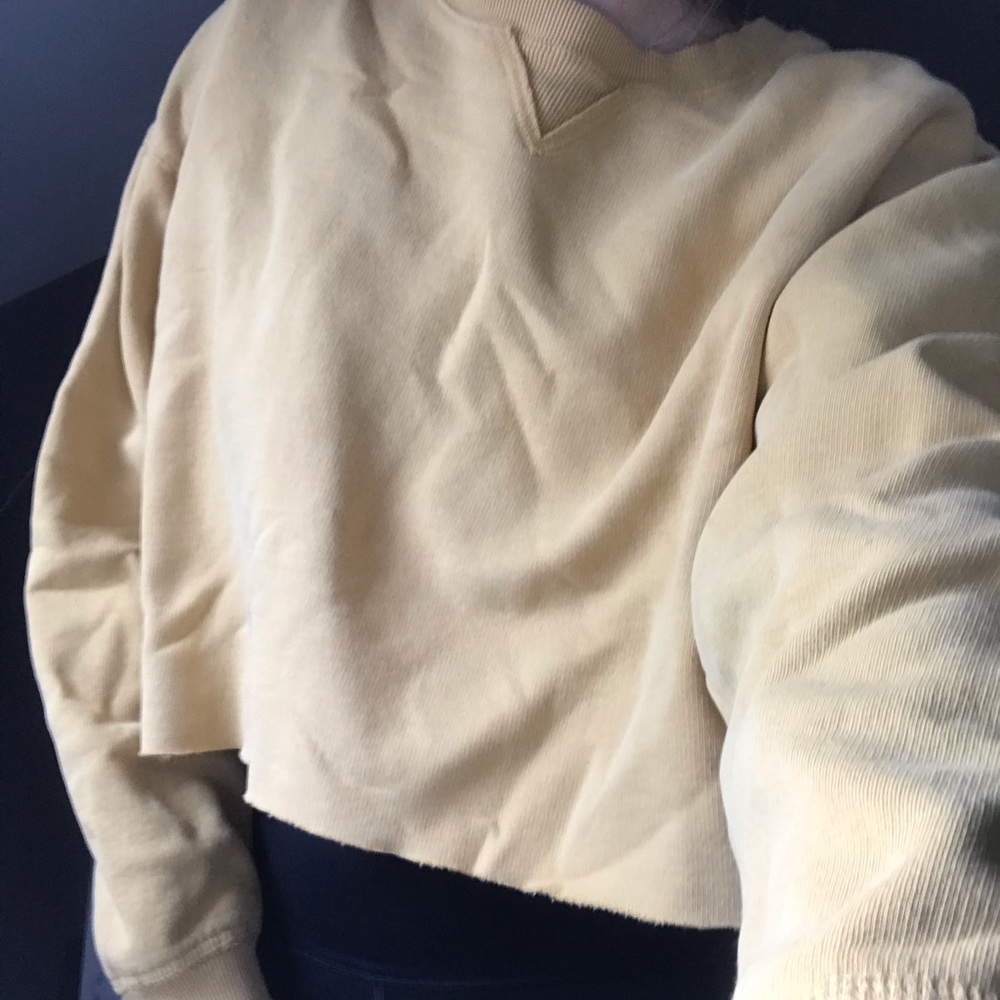 Cropped yellow crew neck sweatshirt
